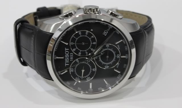Review đồng hồ Tissot T035.617.16.051.00 với 3 mặt số phụ - hình 1